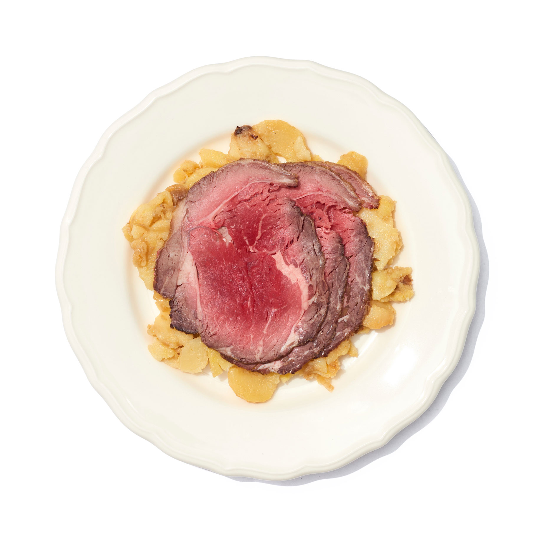 Roast beef sobre patatas asadas de Pastelería Mallorca